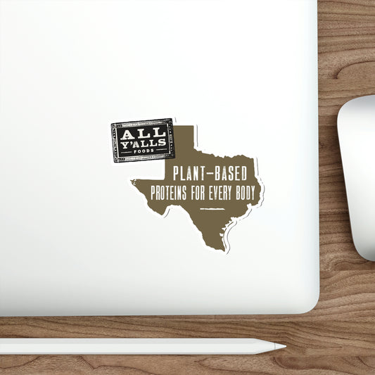 All Y'alls Foods Texas-shaped die-cut sticker on laptop. Plant-based protein logo, vegan brand marketing.