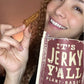 Smiling woman enjoying Cinnamon Churro plant-based jerky, a vegan-friendly and gluten-free snack, perfect for those seeking tasty vegan jerky and protein-packed plant-based treats.