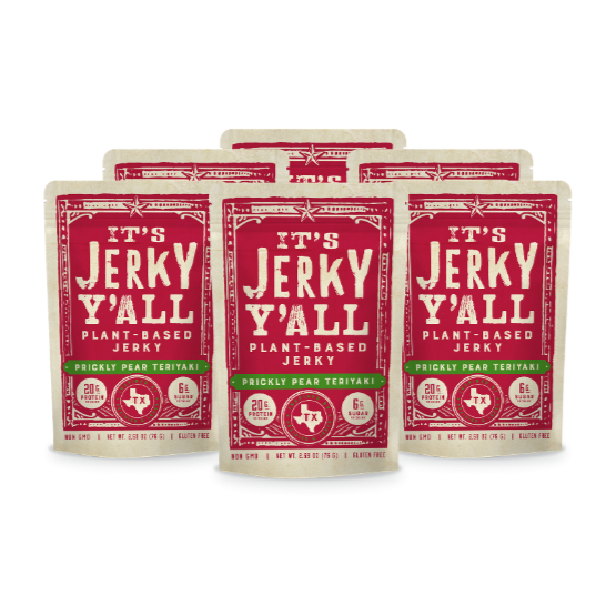 
Multiple bags of "It's Jerky Y'all" plant-based jerky in Prickly Pear Teriyaki flavor, displayed in a grouped arrangement showcasing the product's packaging design and bold branding.